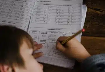 toddler writing indoors